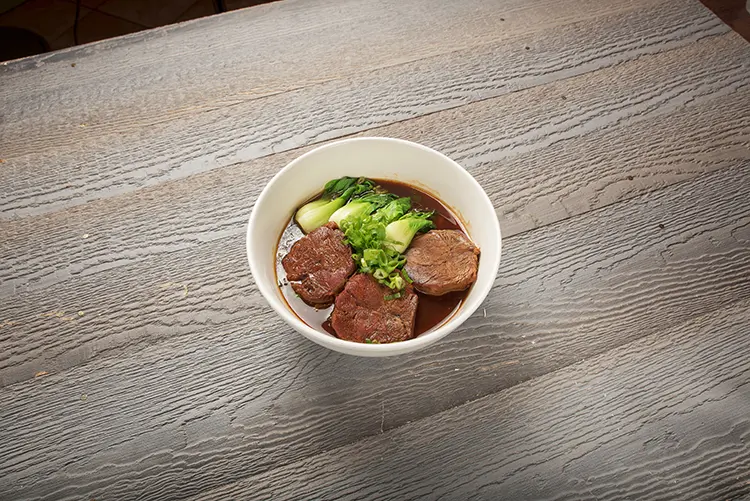 Braised beef noodle soup with bok choy and green onions at P P Pop Taiwanese Noodle Restaurant, a Taiwanese Restaurant in Monterey Park
